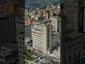 Vertical video. La Spezia, Italy. Palazzo Comunale, the rationalist city hall tower rising above ...