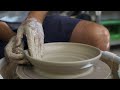 Throwing a shallow bowl on the pottery wheel