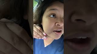 Girl Startled and Frustrated by a Tick on Her Face
