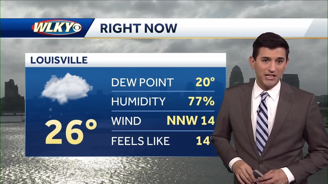 Snow moving out, but cold sticks around - YouTube