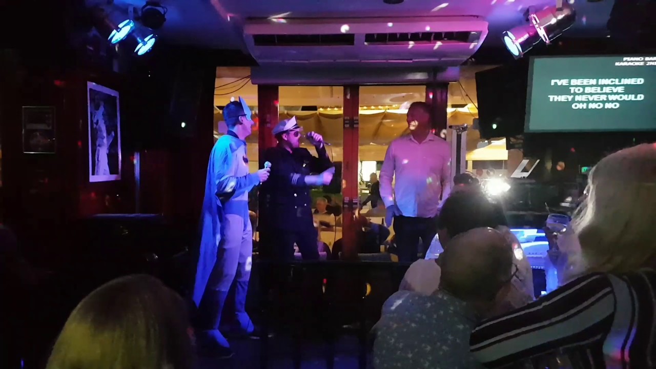 Piano bar magalluf.Karaoke staff having a good time!!