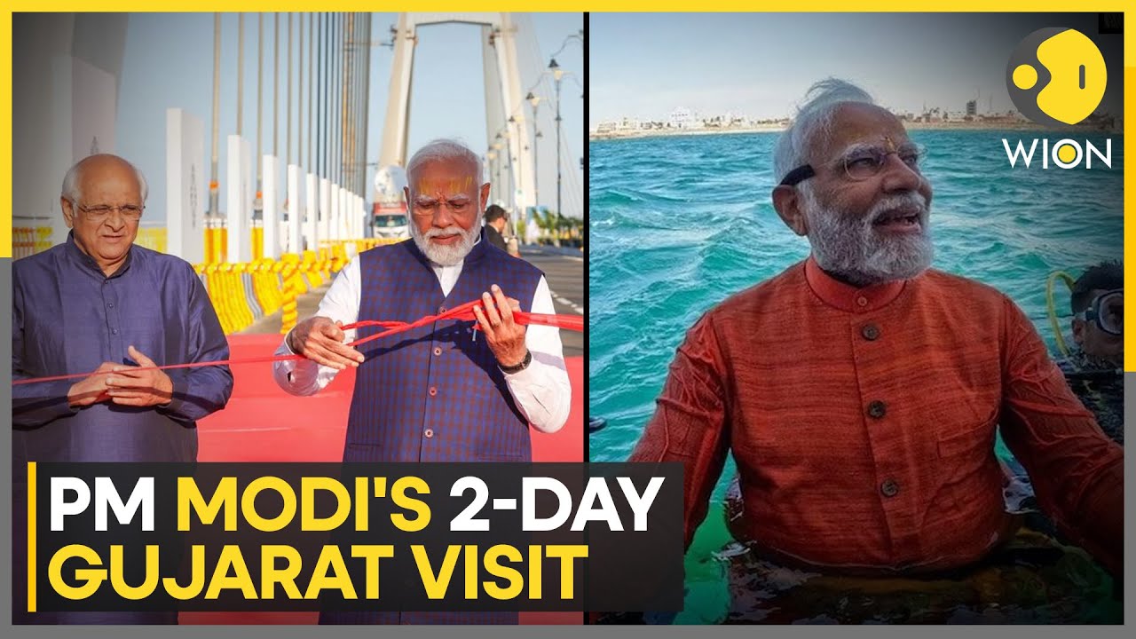 Modi In Rajkot Indian PM Modi holds road show in Rajkot, performs underwater puja in ...
