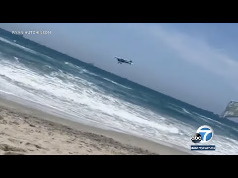 Horrified beachgoers watch as plane crashes into the ocean at Huntington Beach | ABC7