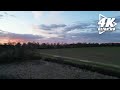 The sun sets over a stunning tree horizon (Drone Views)