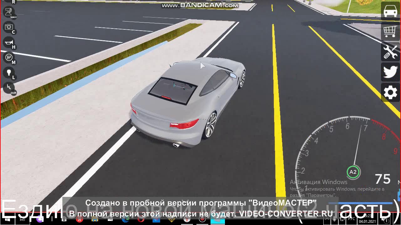 На машине ездию