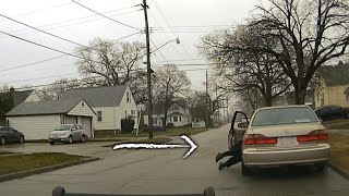 Cop Dragged Along Road as Driver Takes Off During Traffic Stop