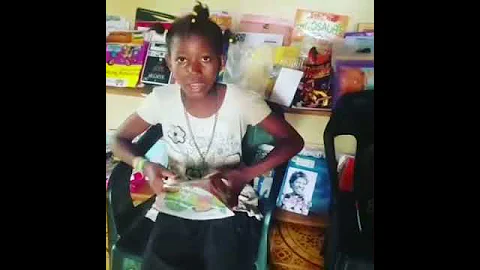Isatu Conteh showing her love for reading