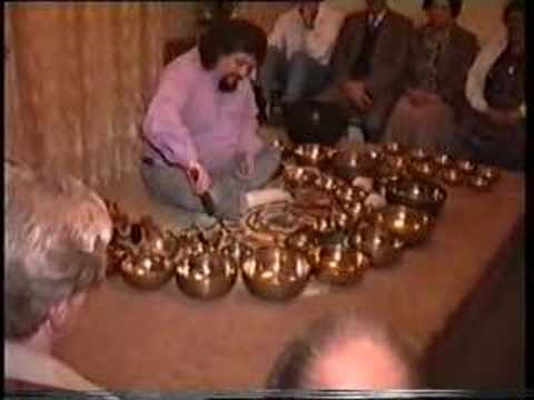 www.frankperry.co.uk. First half of a short introductory improvisation upon antique Tibetan Singing Bowls prior to evening workshop at the Spiritualist Church in Aberdeen, Scotland 10th October 1995 by Frank Perry. As much as I could fit on the platform and get on a train. I got my first singing bowls in 1971 and now have around 300 of them. These here are antiques extremely hard to find nowadays. I sometimes like to begin a workshop by playing the bowls alone allowing them to speak from within the silence before including the sound of my voice. I have released 14 albums featuring my Tibetan Singing Bowl music and you can find out more about those on my website listed above. It had been arranged to record the evening and so thankfully we have this record.