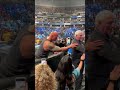 The rock greets some makeawish families after laying the smackdown on austin theory
