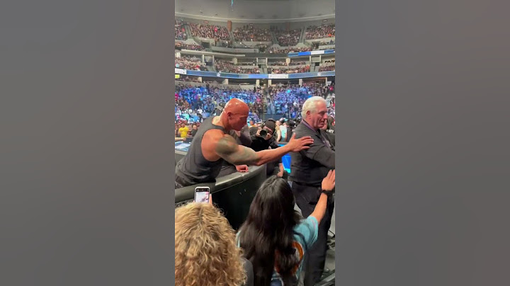 The Rock greets some Make-a-Wish families after laying the SmackDown on Austin Theory