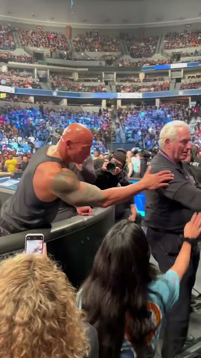 The Rock greets some Make-a-Wish families after laying the SmackDown on Austin Theory