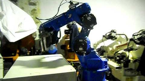 Used industrial robot Motoman YR-HP6-B10 control NX100 at www.eurobots.net