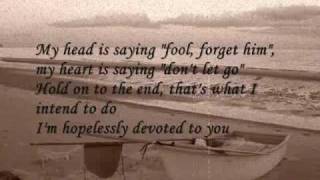 Video thumbnail of "Hoppelessly devoted to you lyrics"