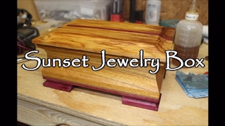 A jewelry box I made for my fiance using Canary Wood and Purple Heart with a Danish Oil finish.