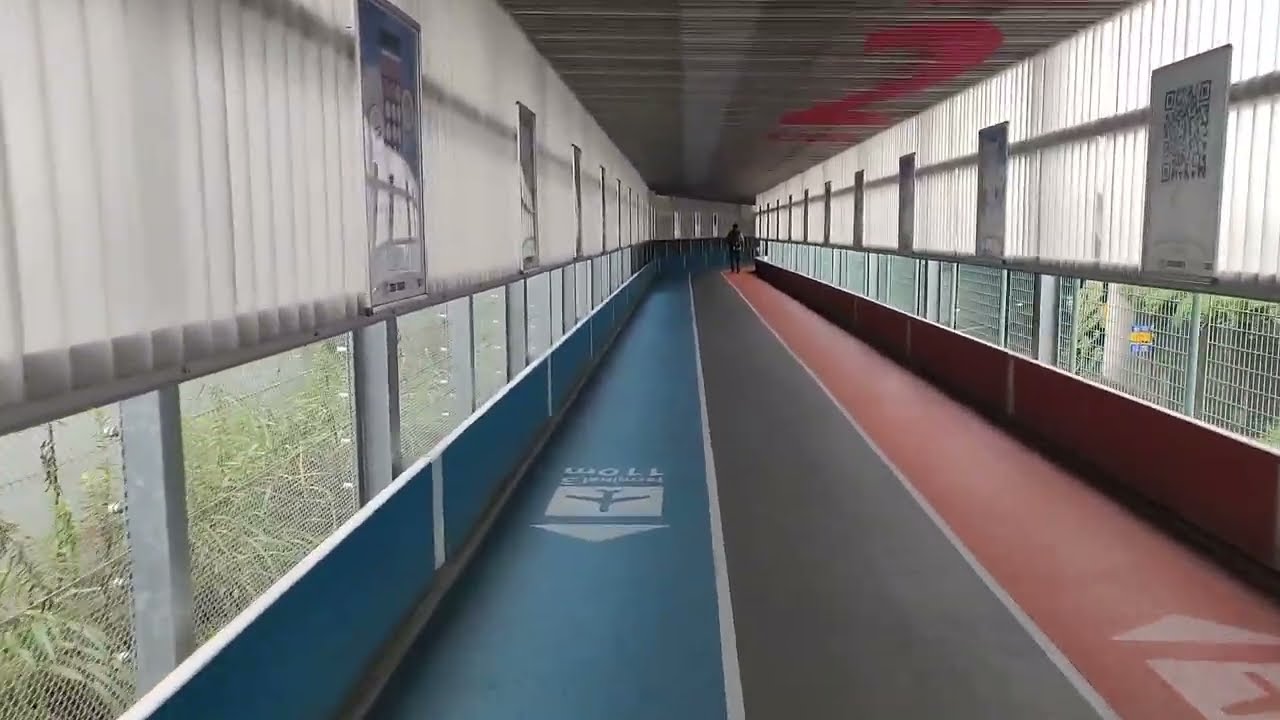 Walking between Terminal 3 and Terminal 2 at Narita International Airport in Tokyo, Japan in 2021