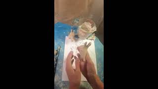 Clay Making a Giraffe Head