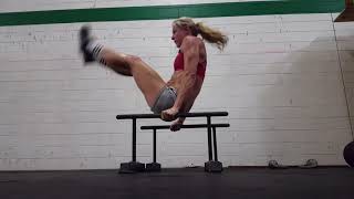 Gymnastic shoot through on parallette
