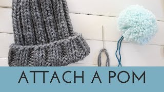 How to Attach a Pom Pom to a Hat  Add a Pom to a Knit Beanie Tutorial