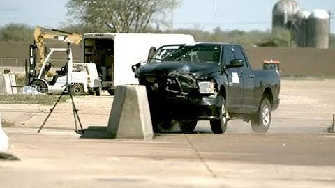 MASH Test 4-11 on a 20:1 Flared Concrete Barrier