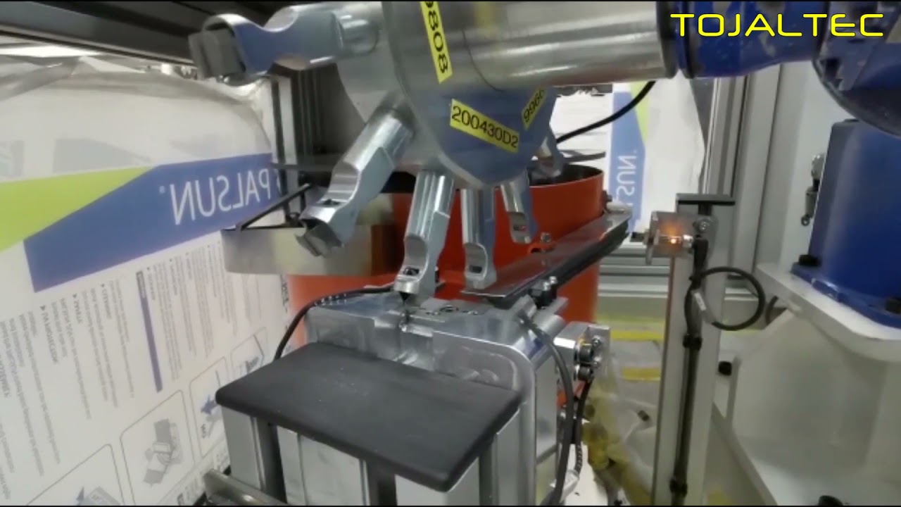 Component insertion robotized cell - YouTube