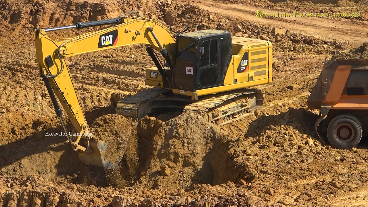 Excavator Cat 320 Digging Soil Loading Into Hyundai Dump Trucks - YouTube