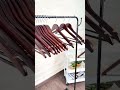 Keep your wardrobe organized and your clothes in great shape with this 20-piece set of wooden hanger
