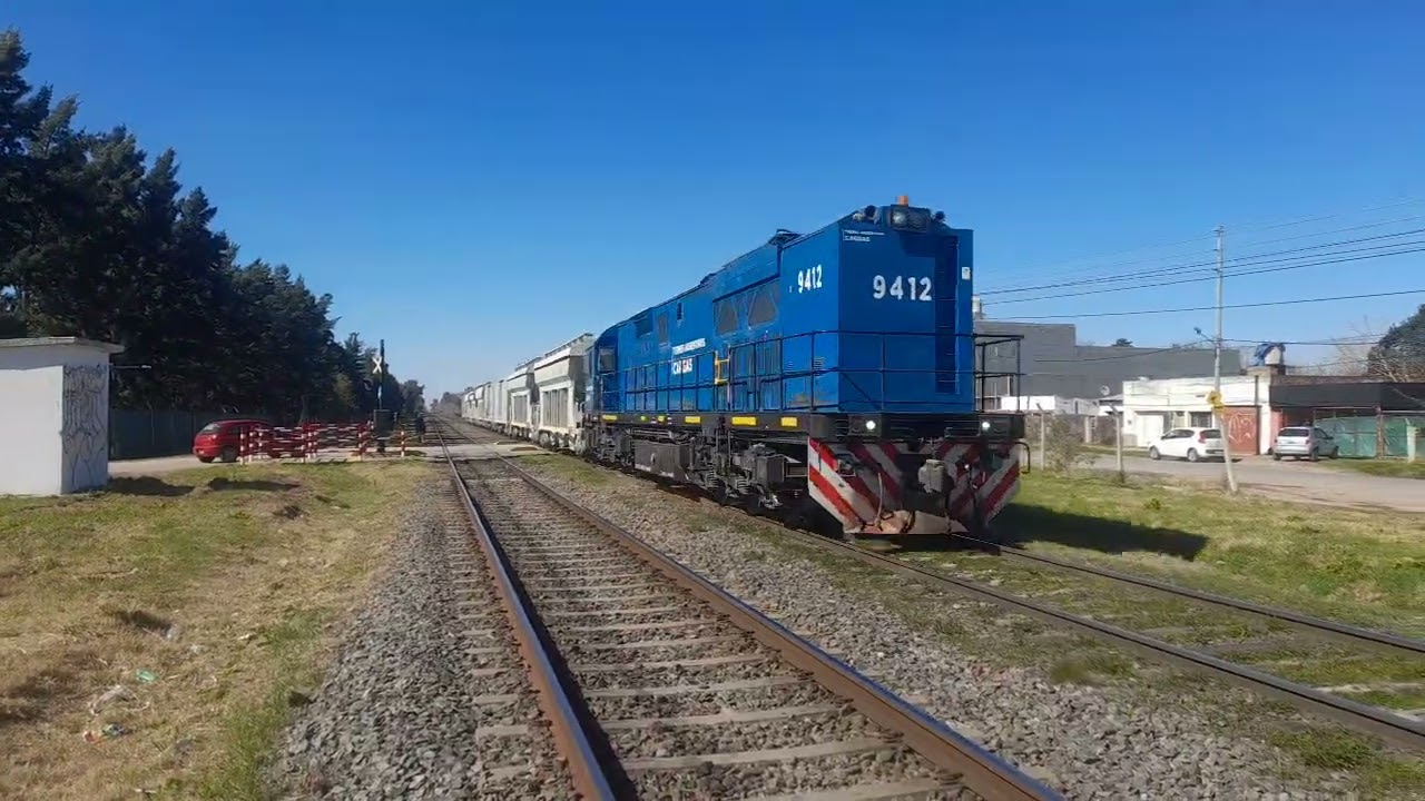 CRRC 9412 a cargo del Arenero cargado pasando por Astolfi con destino a Cabred 13/8/24