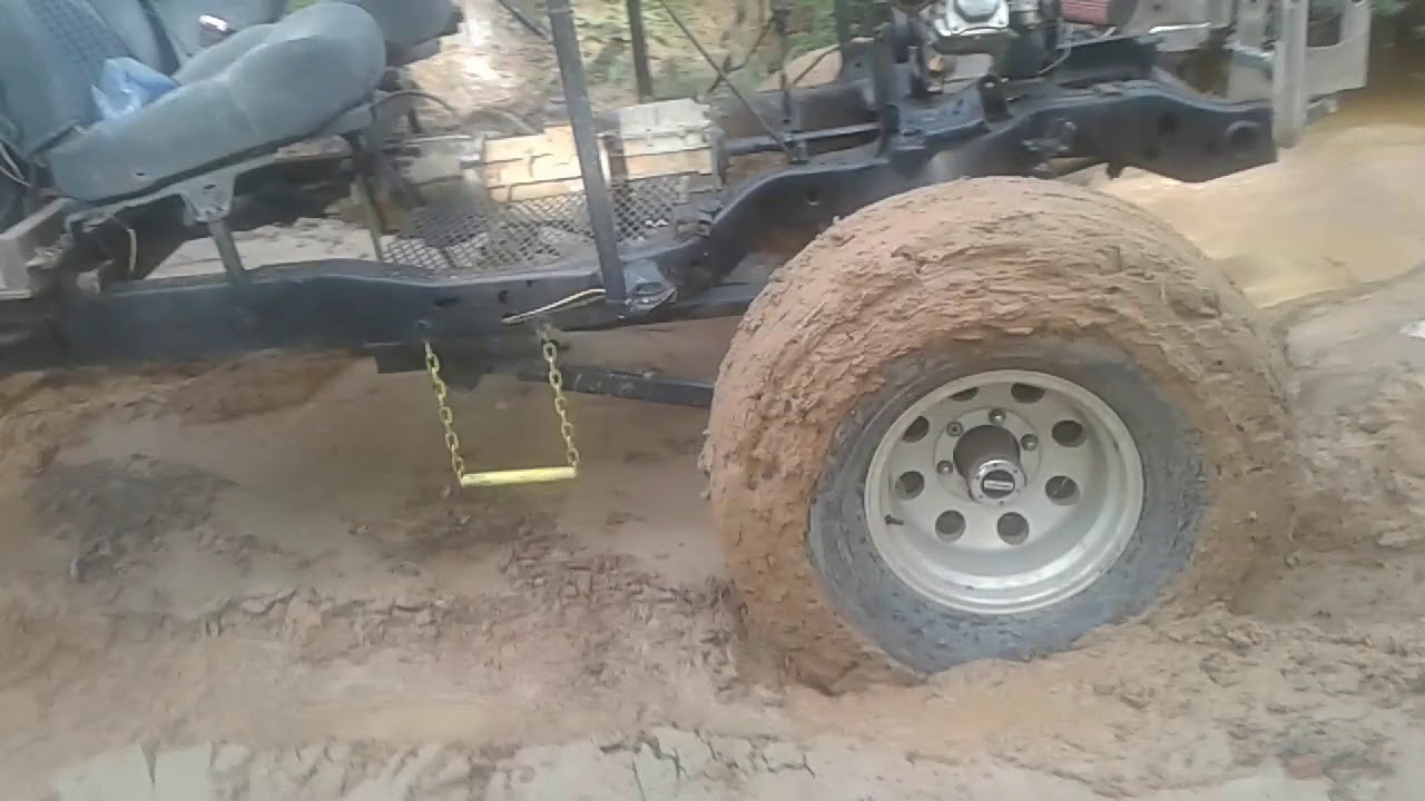 6.5 HP tow truck in the mud