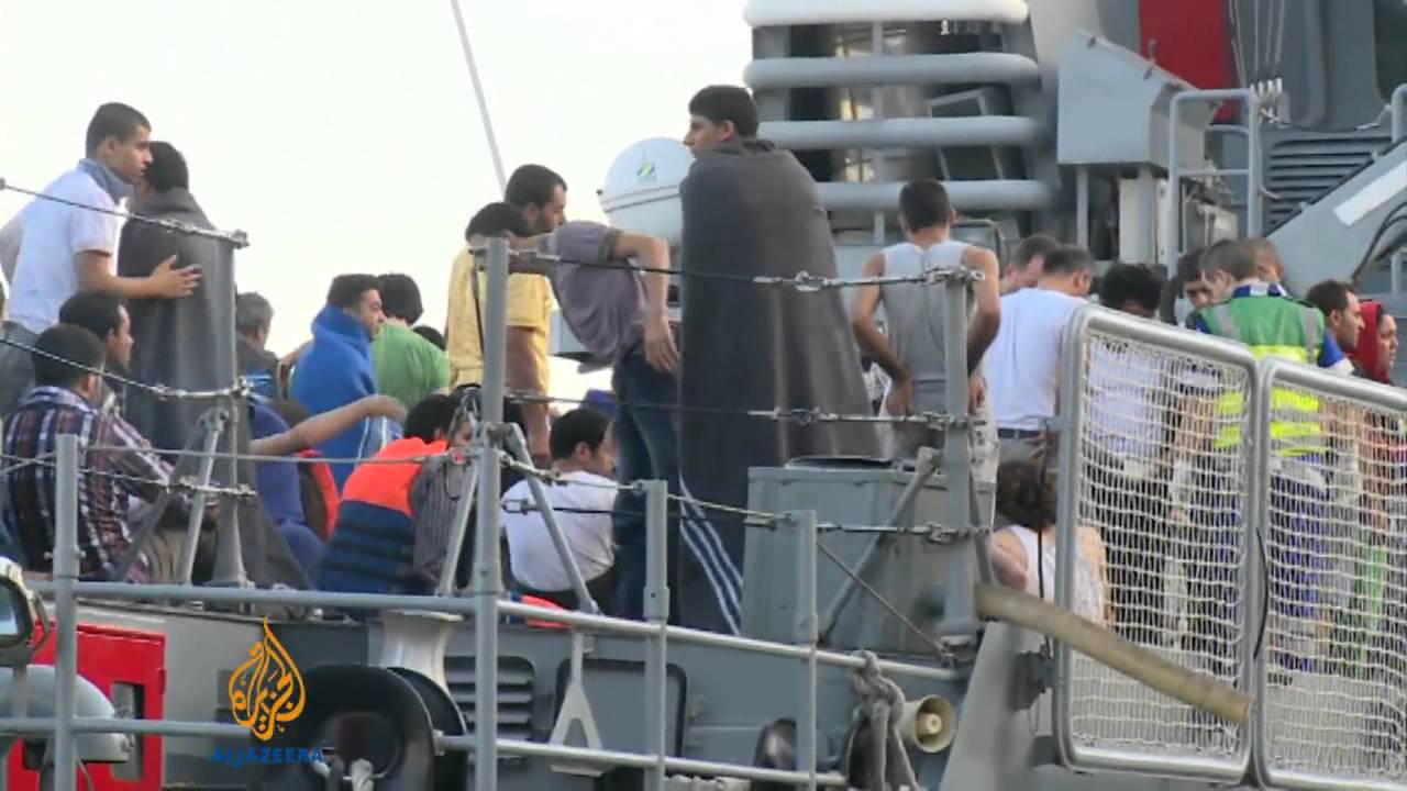 مهاجرون يقولون إنهم تعرضوا لإطلاق نار أثناء مغادرتهم ليبيا