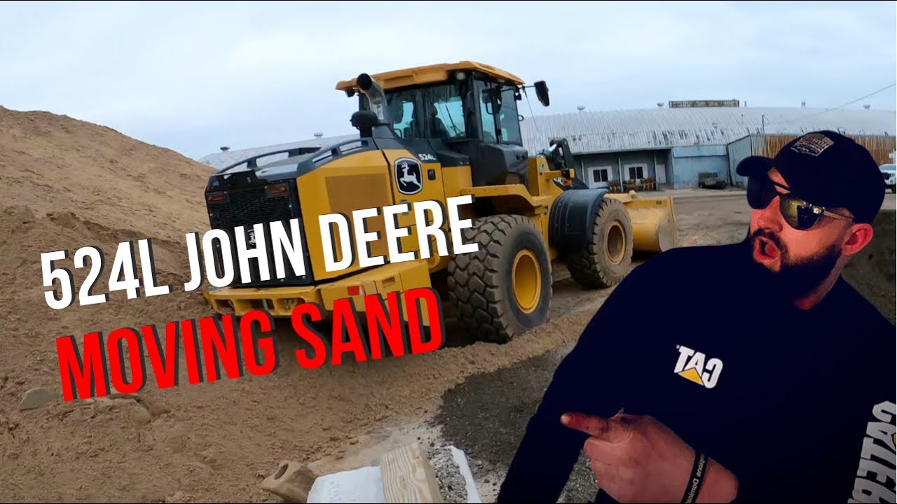 John deere 524L Wheel Loader Cleaning up our yard 