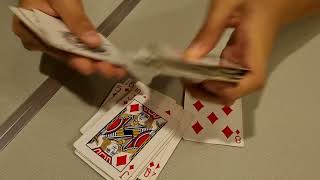 Sorting out a deck of cards into their respective suits