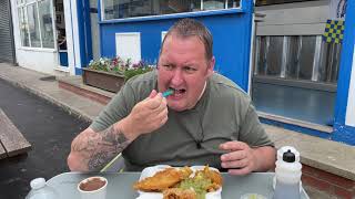 TRYING A MONSTER FISH CAKE OPPOSITE LEEDS FOOTBALL CLUB