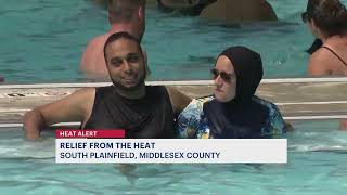Cool at the pool: NJ residents seek refuge from scorching summer heat
