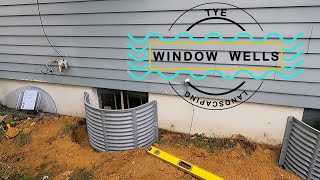 Window wells, window well covers and yard grading to get water away from a foundation.