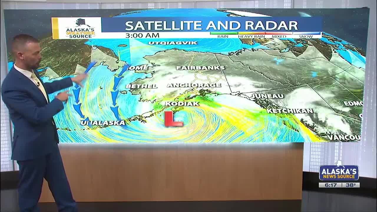 Colder air on the move, as rain and snow tapers off - YouTube