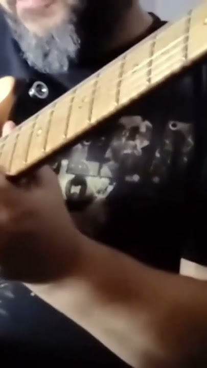 A Man Passionately Plays Guitar at Home 🎸🏠