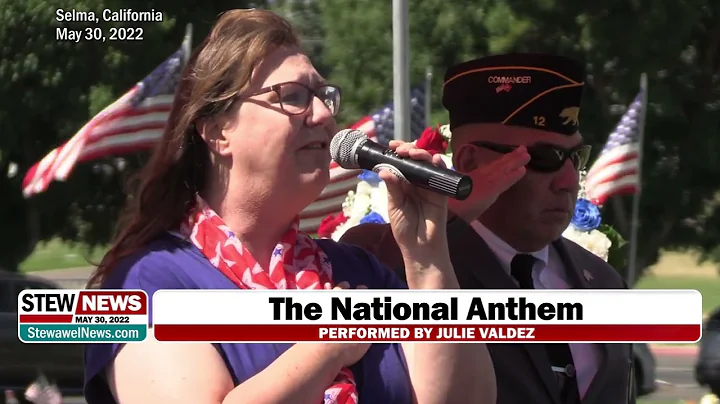 Julie Valdez performs the National Anthem on Memor...