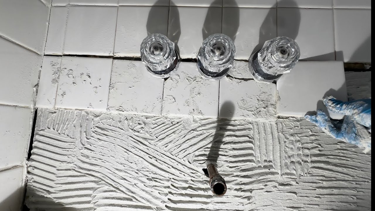 Ремонт плитки в душе