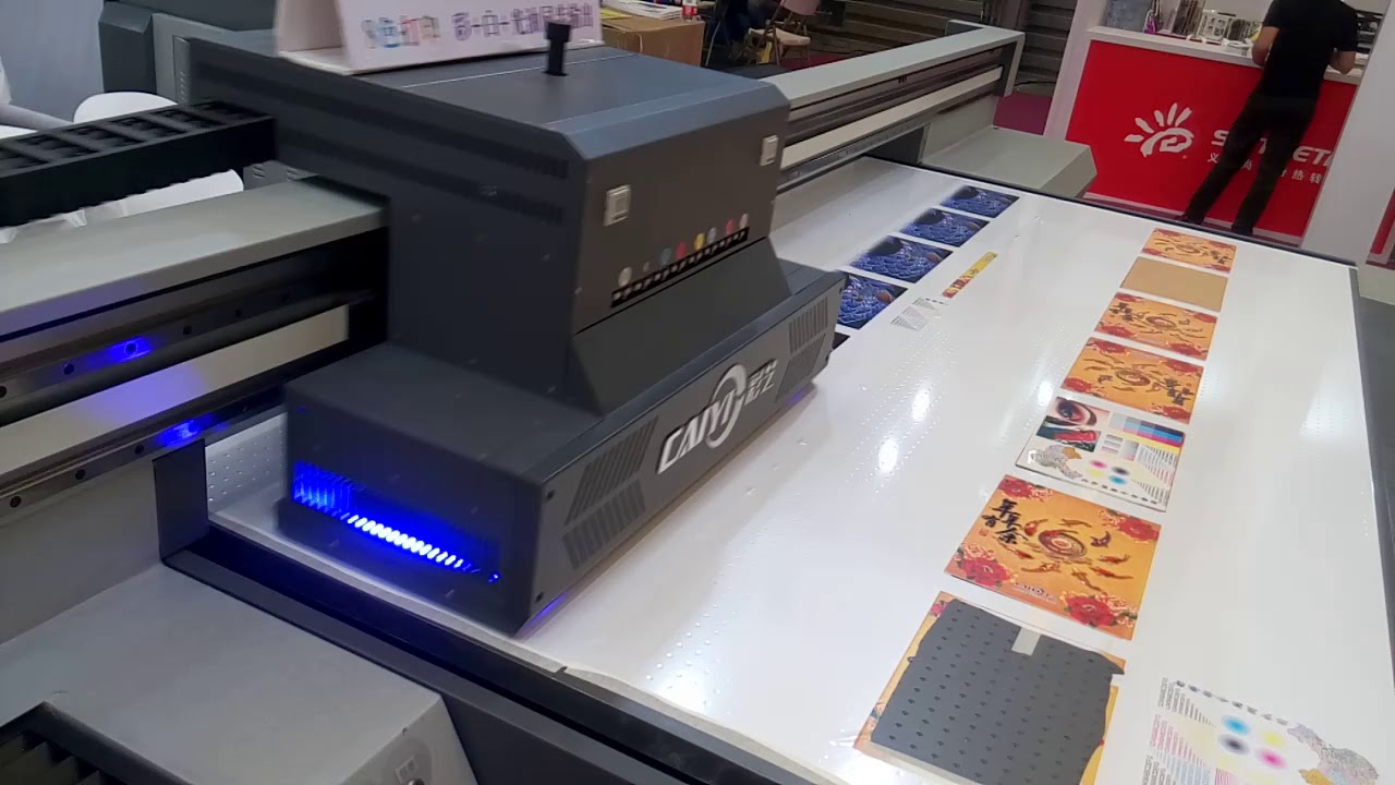 CAIYI UV Flatbed Printer with Ricoh Gen6 printhead - YouTube