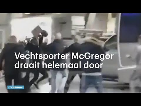 Vechtsporter McGregor draait door en gooit steekwagen tegen bus  - RTL NIEUWS