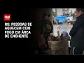 RS: Pessoas se aquecem com fogo em área de enchente | CNN PRIME TIME