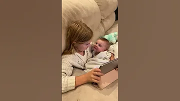 Heart Warming Snuggling Sisters ViralHog 