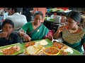 Butter naan unlimited nonveg meals chettinadu chicken mom and children eating in chettinadu hotel