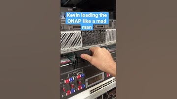 Kevin loading the WD 22TB Red Pro HDDs into the QNAP NAS like a crazy person. Review in process.