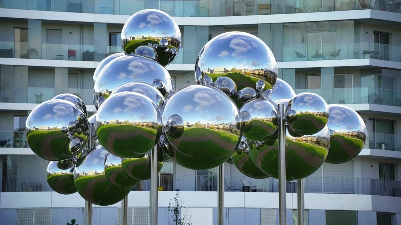 mirrored steel bubbles shape kinetic sculpture by vincent leroy in