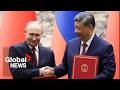 China, Russia sign unity pacts as Xi warns world at risk of return to 