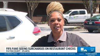 FIFA fans see surcharges on checks at some Atlanta restaurants