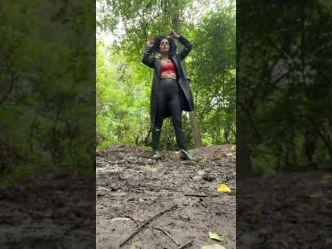 Hunters walk and jump in muddy puddle