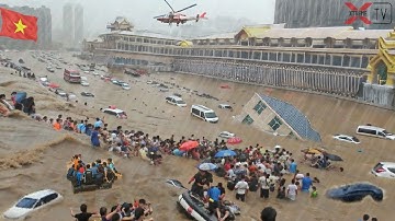 Tragedie in Vietnam — MEER DAN 395.000 VASTGEVANGEN terwijl recordoverstromingen huizen en auto