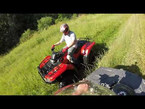 honda-rancher:-on-stock-tires.-polaris-sportsman-500ho-26"-itp-terracross